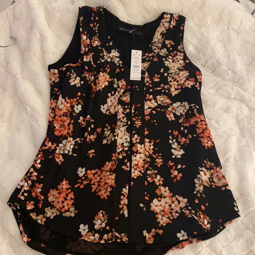 Sleeveless printed blouse. Brand new never worn